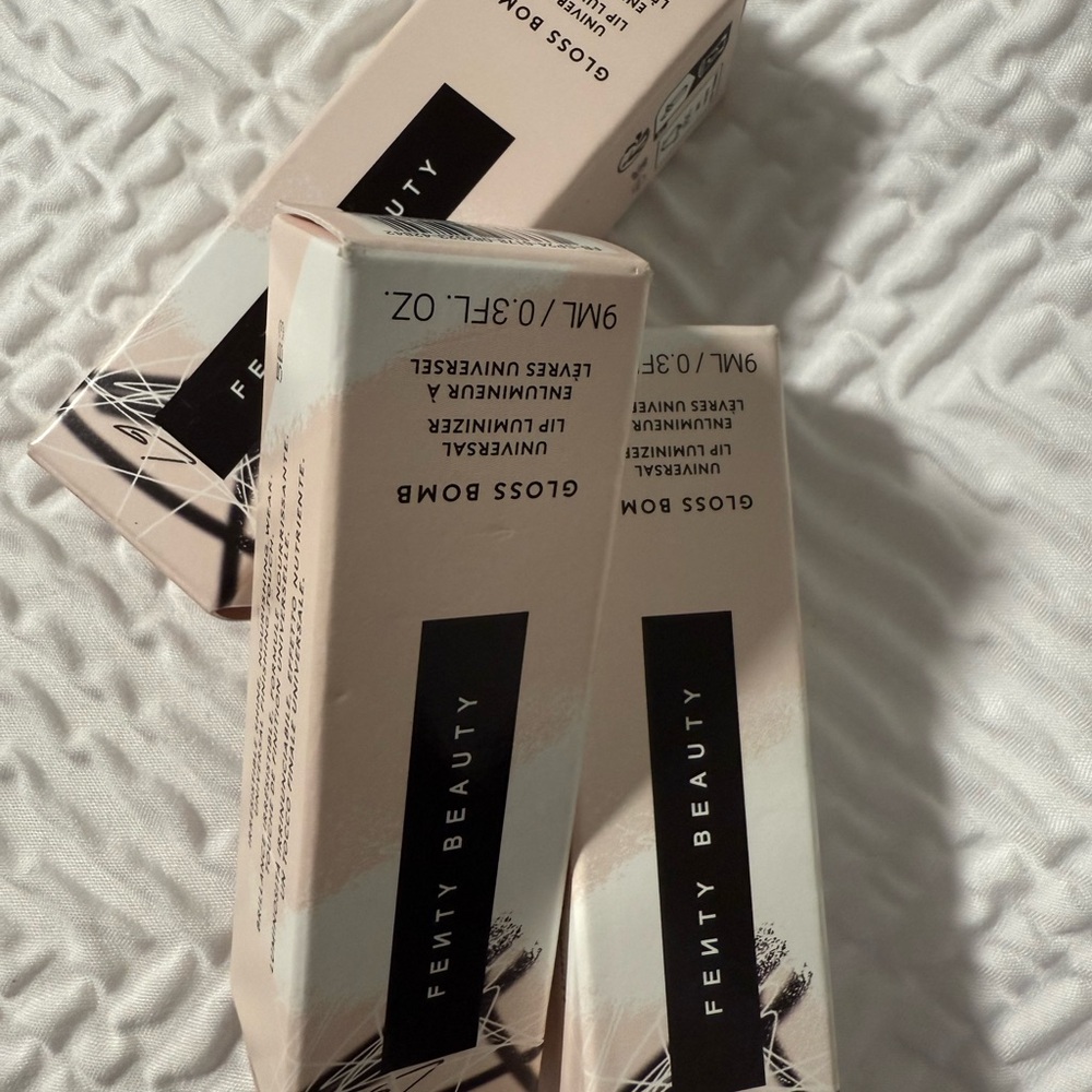 Fenty Beauty Gloss Bomb in Black and Cream Packaging